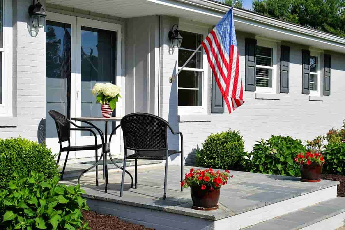 Outdoor living space home sweet home front porch with a bistro table seating area white hydrangea t20 g Rz Xaz